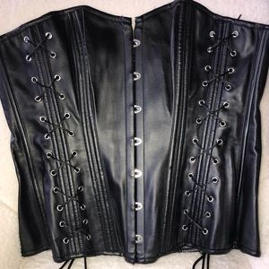 Things I found in his closet. Sexy leather corset